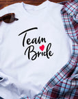 Team Bride Shirt – Festive Wedding Party T-Shirt – Bachelorette Party Tee – Matching Bridal Squad Shirts – Bride Tribe Gift Idea